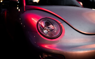 Car redlight retrofuturism neongirl longhair - a close up of a car free wallpaper