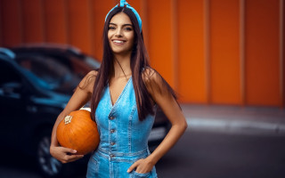 Woman blue dress pumpkin halloween - a blue dress holding free wallpaper