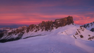 Snowy mountain pink sky city - romanesque free wallpaper