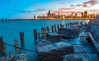 City skyline harbor rocks cloudy - the foreground and a body of water free wallpaper
