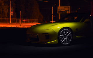 Yellow sports car night streetlight - rim free wallpaper