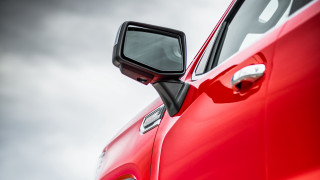 Red car side mirror cloudy - a red car free wallpaper