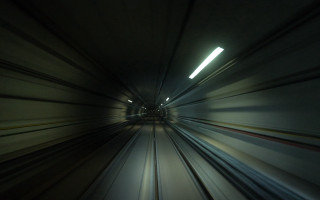 Futuristic train tunnel light person - a train traveling free wallpaper