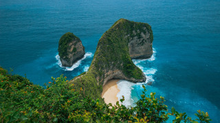 Large rocks green hillside ocean - a lush green hillside next free wallpaper for desktop