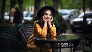 Woman smiling park hat portrait - a woman sitting free wallpaper for desktop