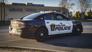 Police car parking lot bare - a police car free wallpaper