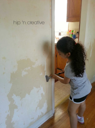 Girl painting wall roller brush 2 - action painting free wallpaper for mobile