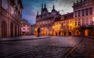 Cobblestone street clock tower dusk - evening free wallpaper