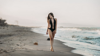 Woman beach dog sand sunset - a dog free wallpaper