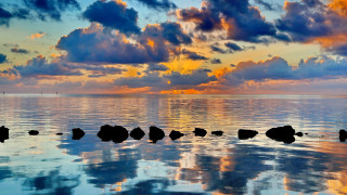 Sunset ocean rocks clouds city - colorful cloud free wallpaper