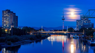 Full moon city river bridge - over a city free wallpaper