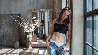 Woman black top leaning wall - fashion photoshoot free wallpaper