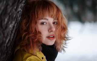 Redhead woman leaning tree snow - anka zhuravleva free wallpaper for desktop