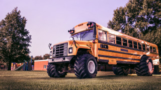 Schoolbus huge tires field trees - huge free wallpaper