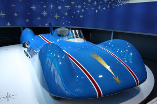 Blue race car museum exhibit - a blue race car free wallpaper