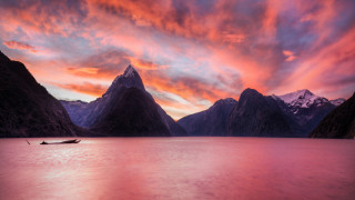 Boat mountains sunset clouds cityscape - brad holland free wallpaper