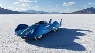 Toy car desert mountains background - symmetric free wallpaper