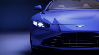 Blue sports car black background 3 - spot free wallpaper