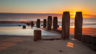 Sunset ocean wooden posts wave - wooden post free wallpaper