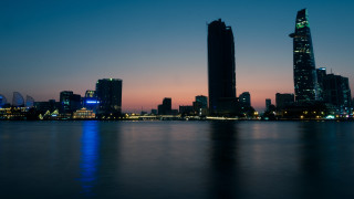 City skyline night water building - a body of water in front free wallpaper