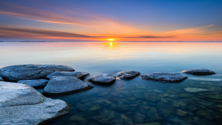 Sunset water rocks beach scene - adam bruce thomson free wallpaper