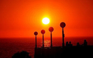 Sunset people bench ocean lighthouse - arthur b. carles free wallpaper