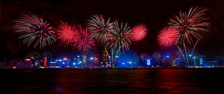 Fireworks city skyline night water - typographic free wallpaper