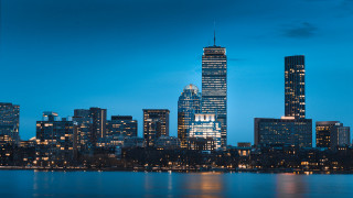 City skyline night water bridge 6 - a large body of water in front free wallpaper