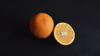 Oranges stilllife moon black surface - one cut free wallpaper