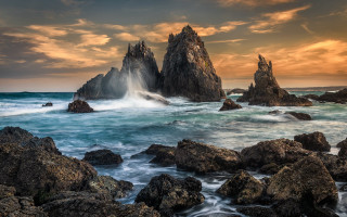 Rocky beach sunset waves clouds - a rocky beach free wallpaper for desktop