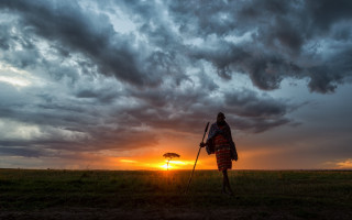 Person walking field umbrella sunset - andrew geddes free wallpaper