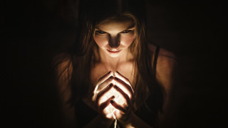 Woman holding string dark light - a string free wallpaper