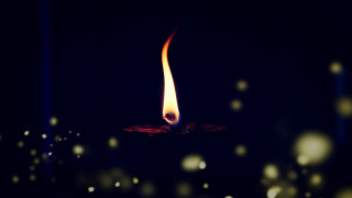 Candle flame dark snow blur - radiant light free wallpaper