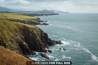 Ocean cliffs beach clouds horizon - scenic free wallpaper