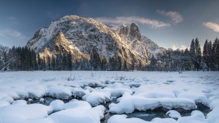 Snowy mountain range stream snow - a snowy mountain range free wallpaper