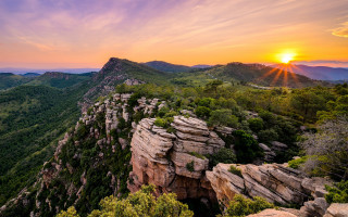 Sunset rocky mountain valley trees - a valley below free wallpaper