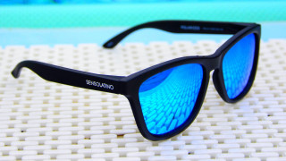 Sunglasses blue mirrored lenses outdoor - a pool in the background free wallpaper