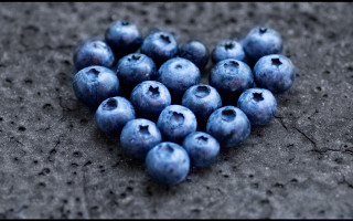 Heart blueberries concrete macro letterboxed - a concrete surface free wallpaper