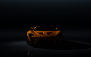 Yellow sports car dark room 29 - a black background and a spotlight free wallpaper