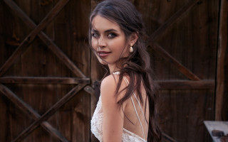 Woman white dress wooden door 2 - a diamond necklace free wallpaper