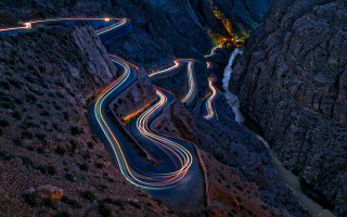 Winding road lights mountains night 2 - rim light free wallpaper