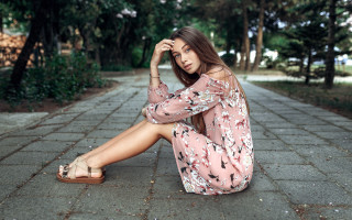 Woman sitting dress sandals outdoors - her foot free wallpaper