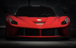 Red sports car dark room 96 - a black background and a spotlight free wallpaper