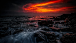 Sunset ocean rocks mountains mystical 2 - sunset over the ocean free wallpaper