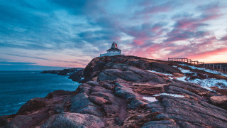Lighthouse rocky cliff sunset pier - a rocky cliff free wallpaper