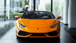 Bright orange sports car showroom 3 - a showroom free wallpaper