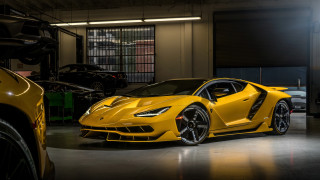 Yellow sports car garage side - a garage area free wallpaper