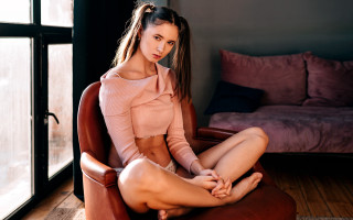 Woman sitting chair window couch - kai carpenter free wallpaper