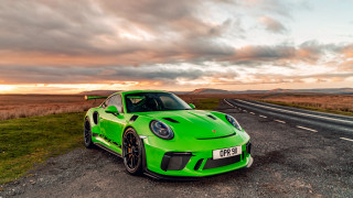 Green sports car sunset cloudy - the side of a road free wallpaper
