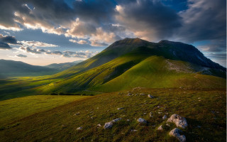 Green mountain cloudy sky grassy - a green mountain free wallpaper